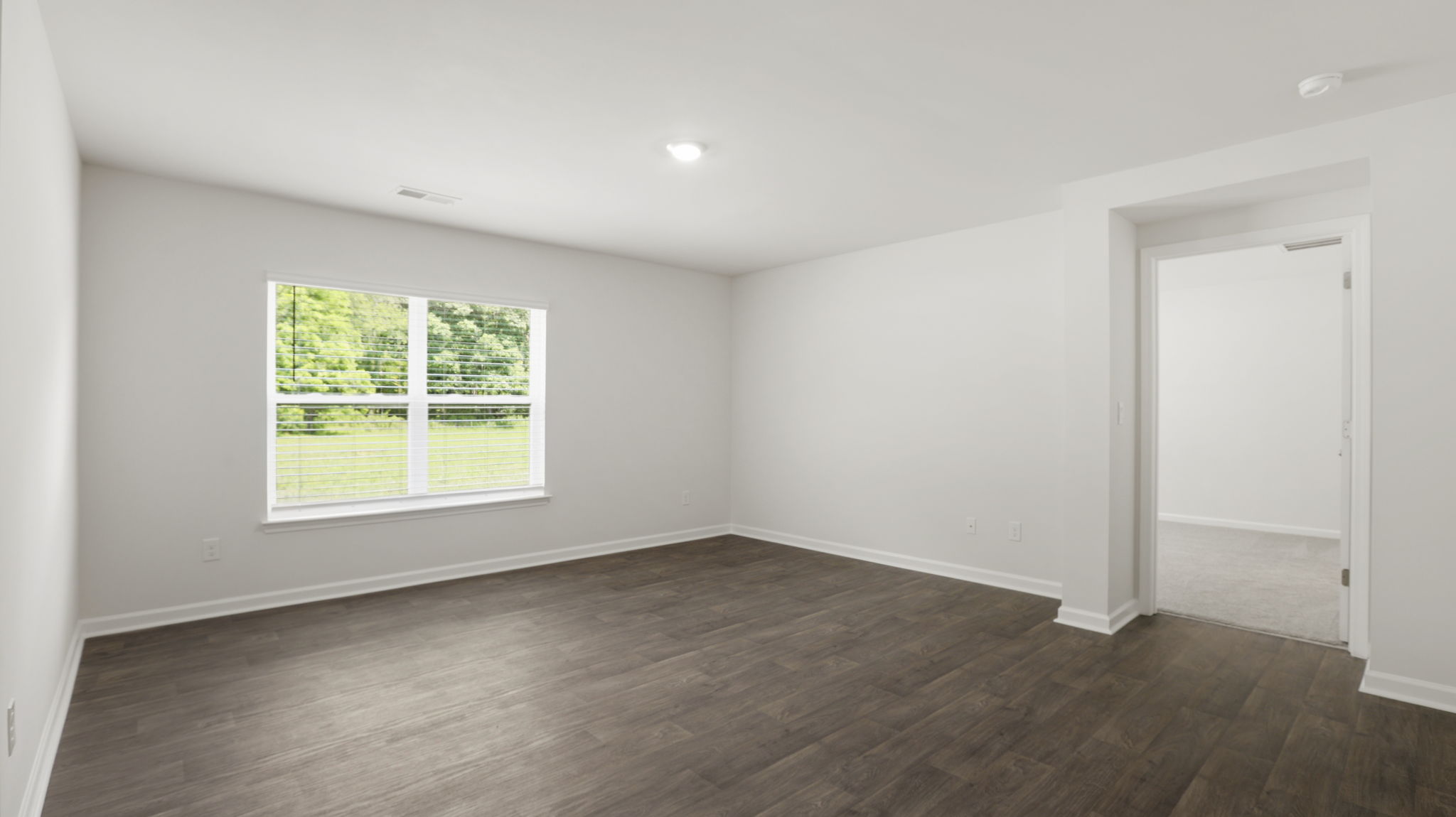 Open living room area with large windows