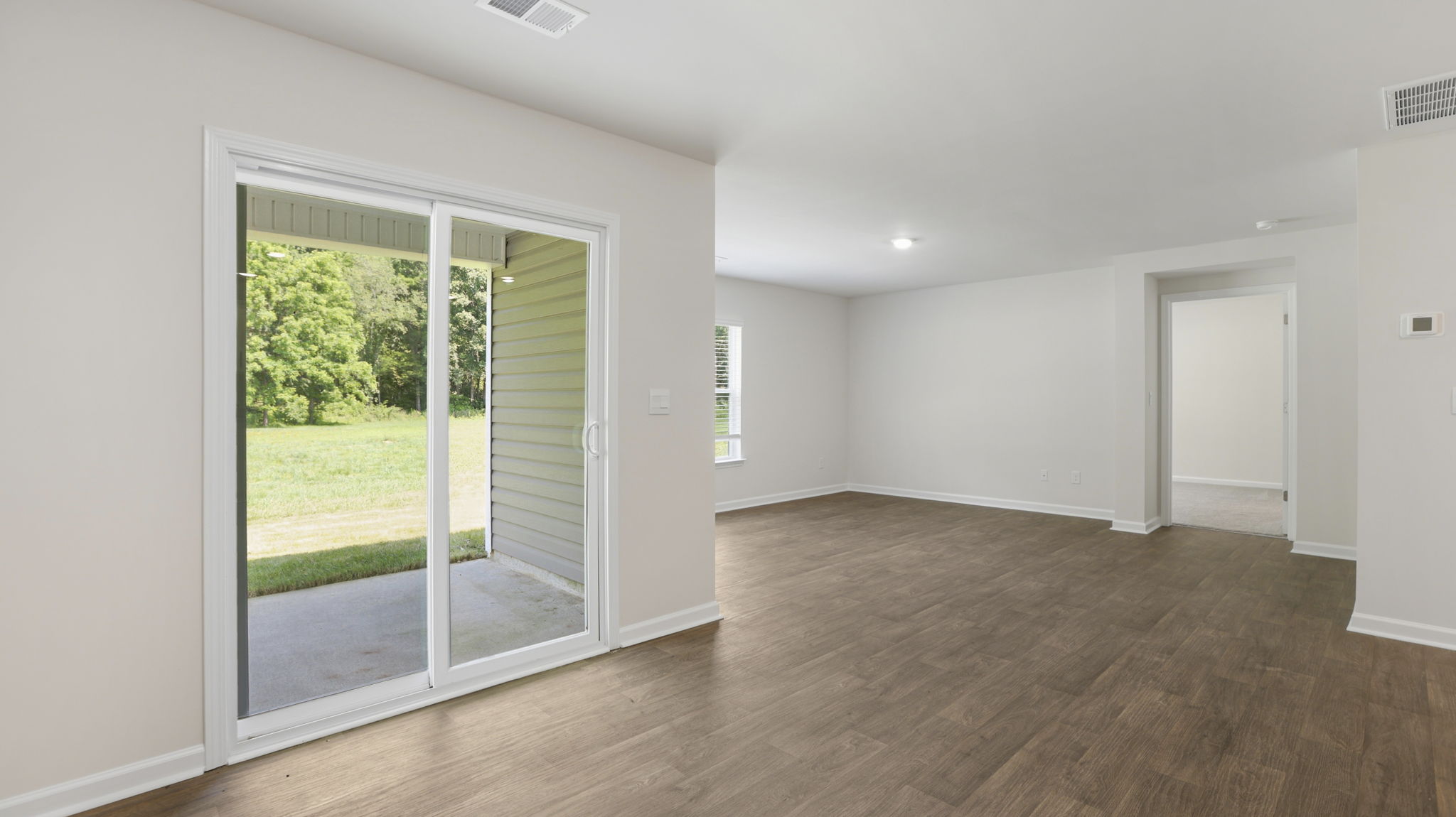 Open dining area with sliding glass doors