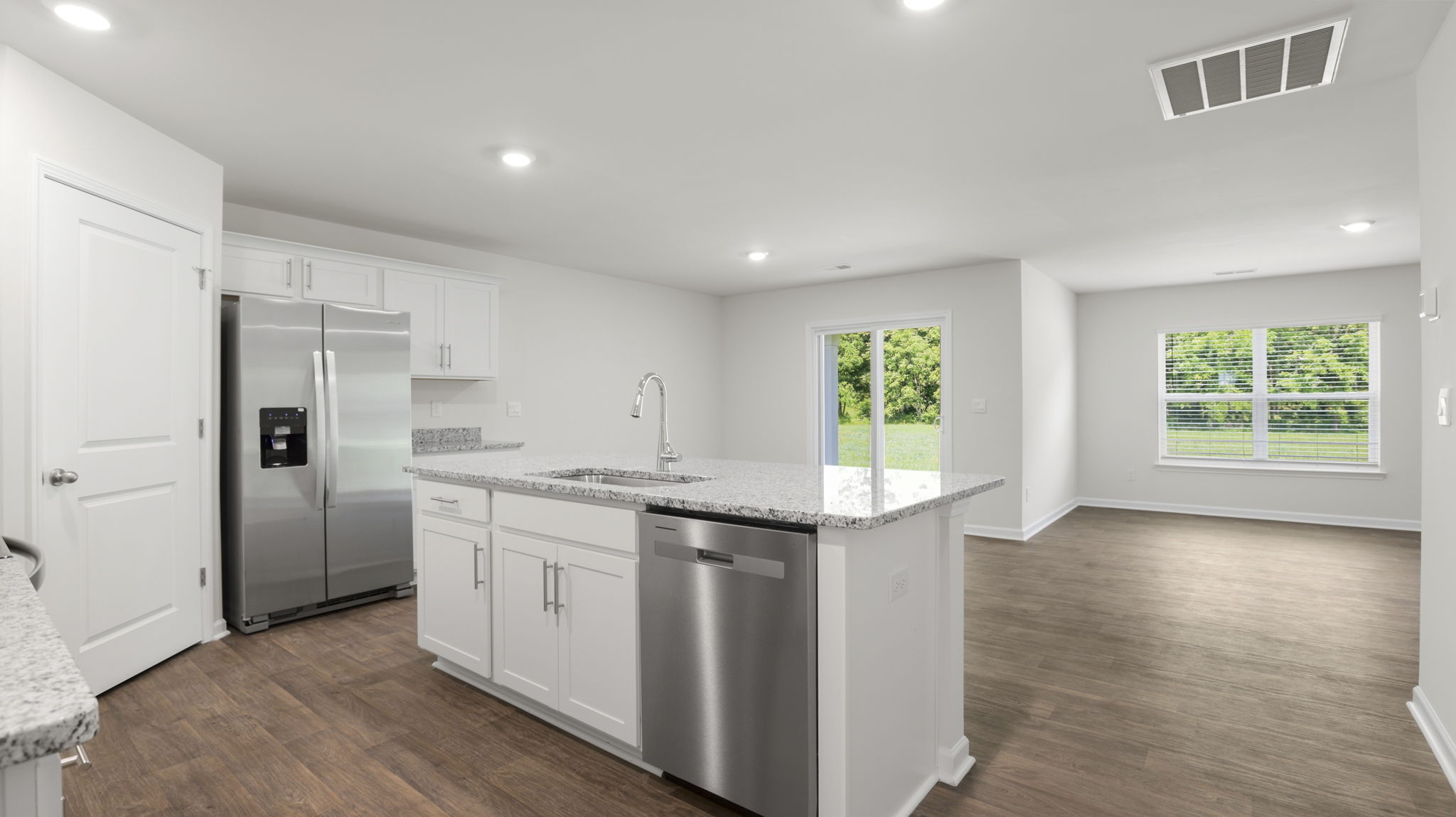 Open kitchen with stainless steel appliances