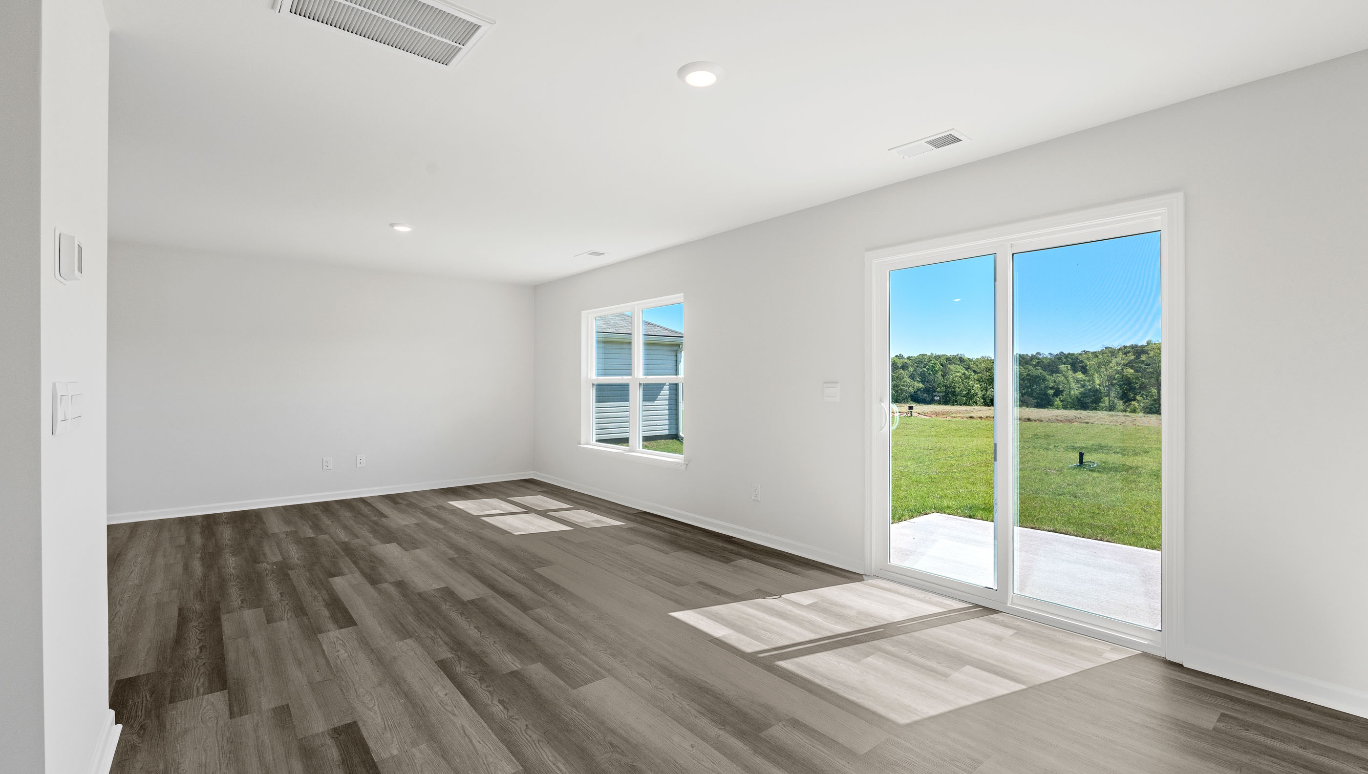 Open living area with sliding glass doors