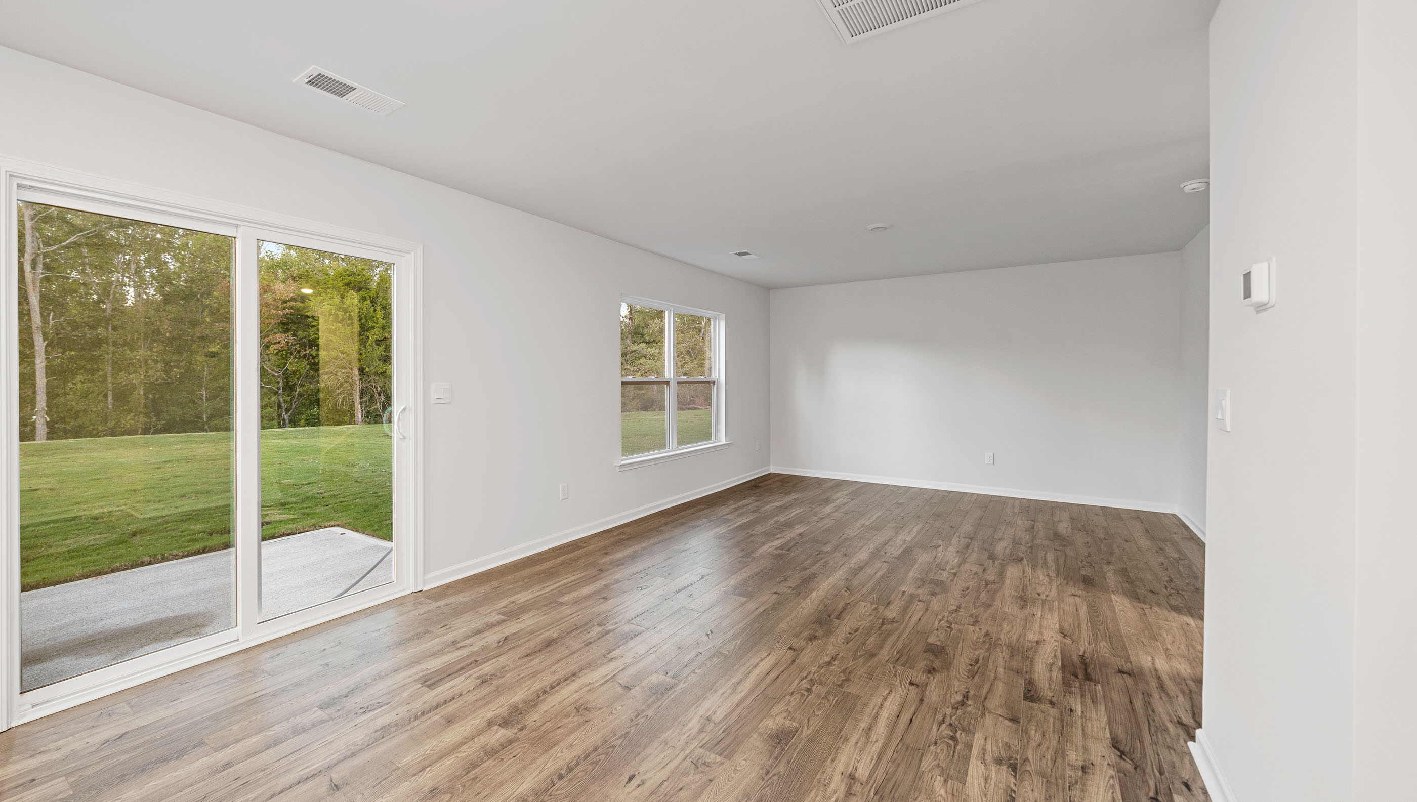 Open dining area with sliding glass doors