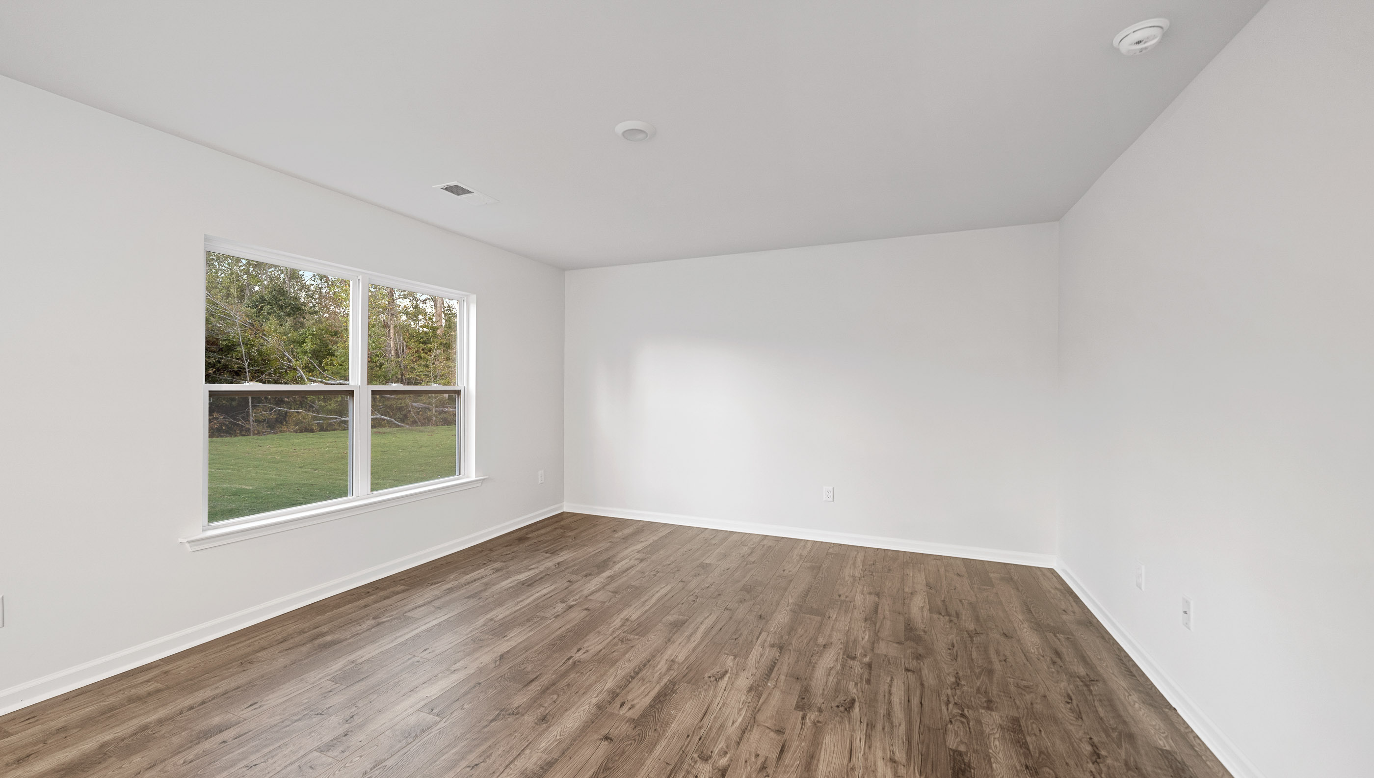 Open living room with large windows