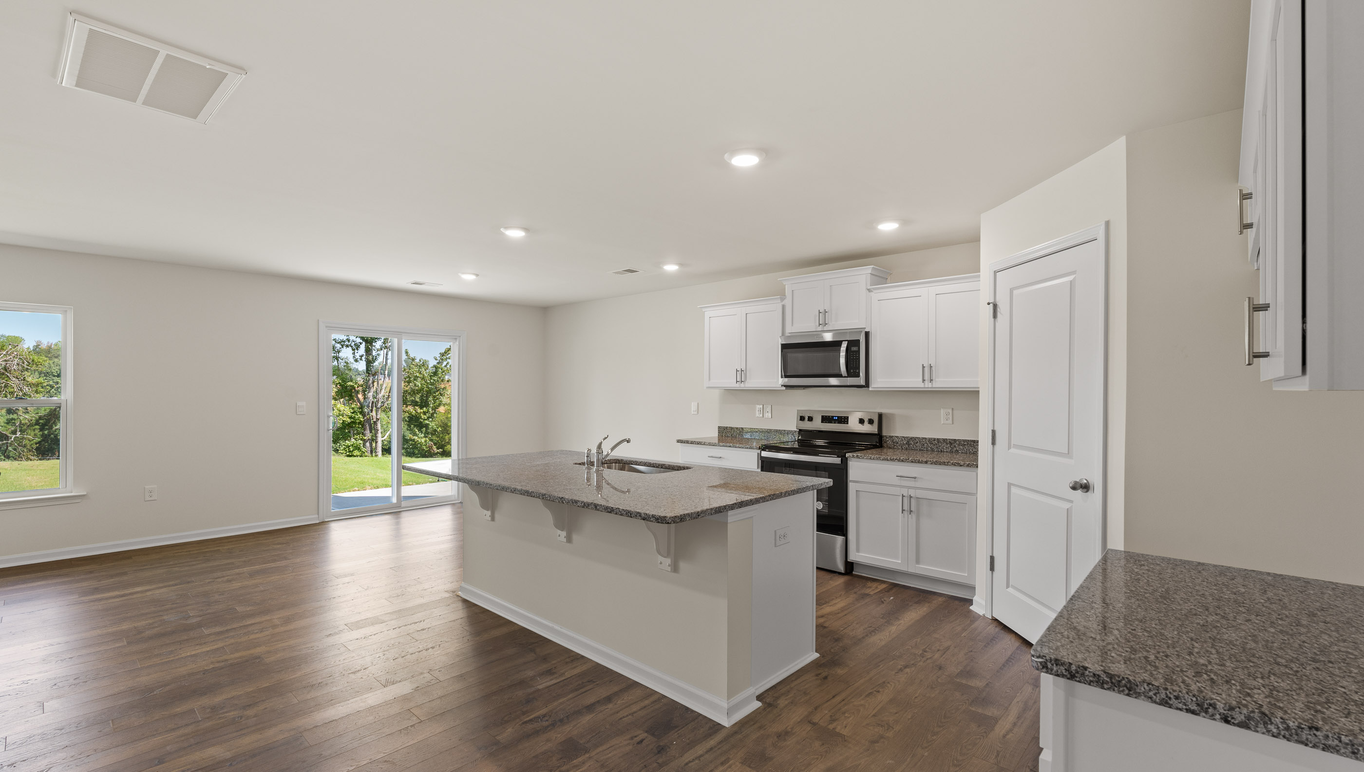 Kitchen with island and stainless steel appliances