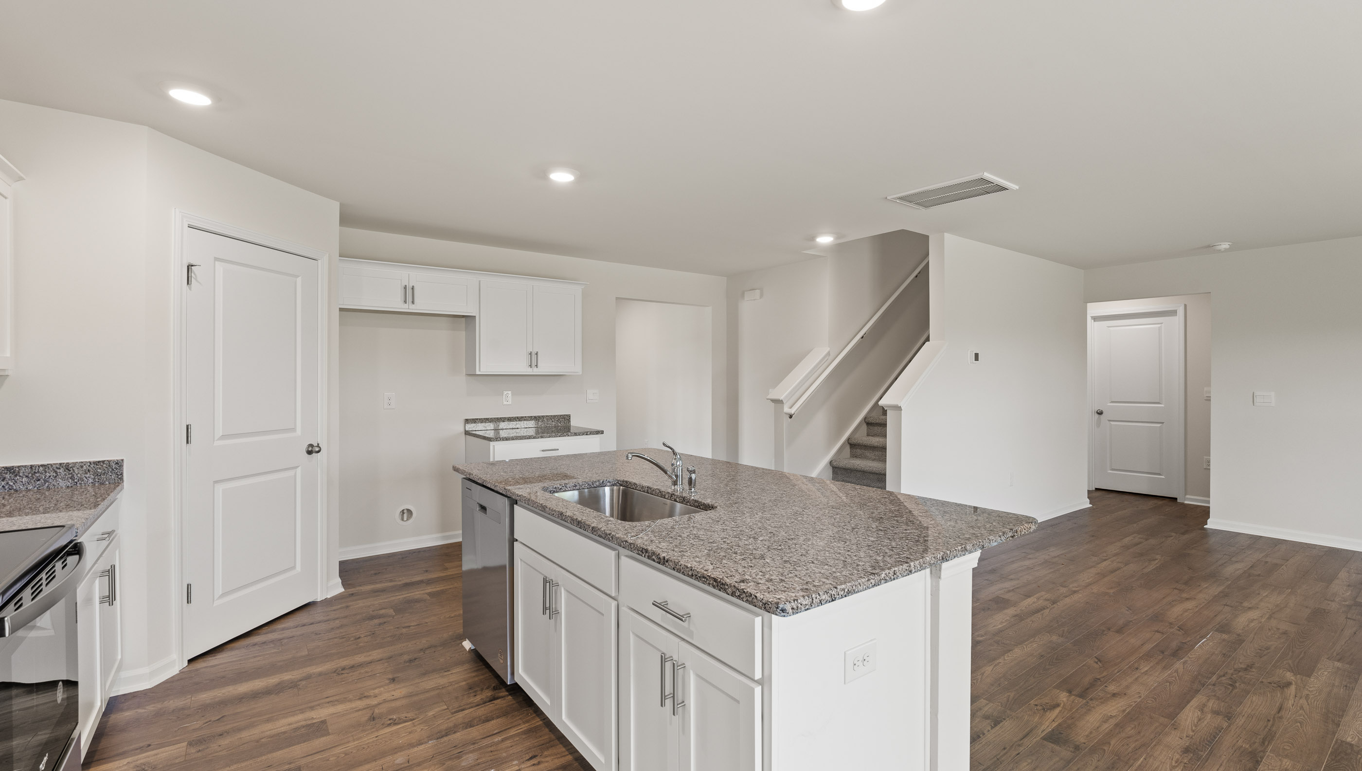 Kitchen with island and stainless steel appliances