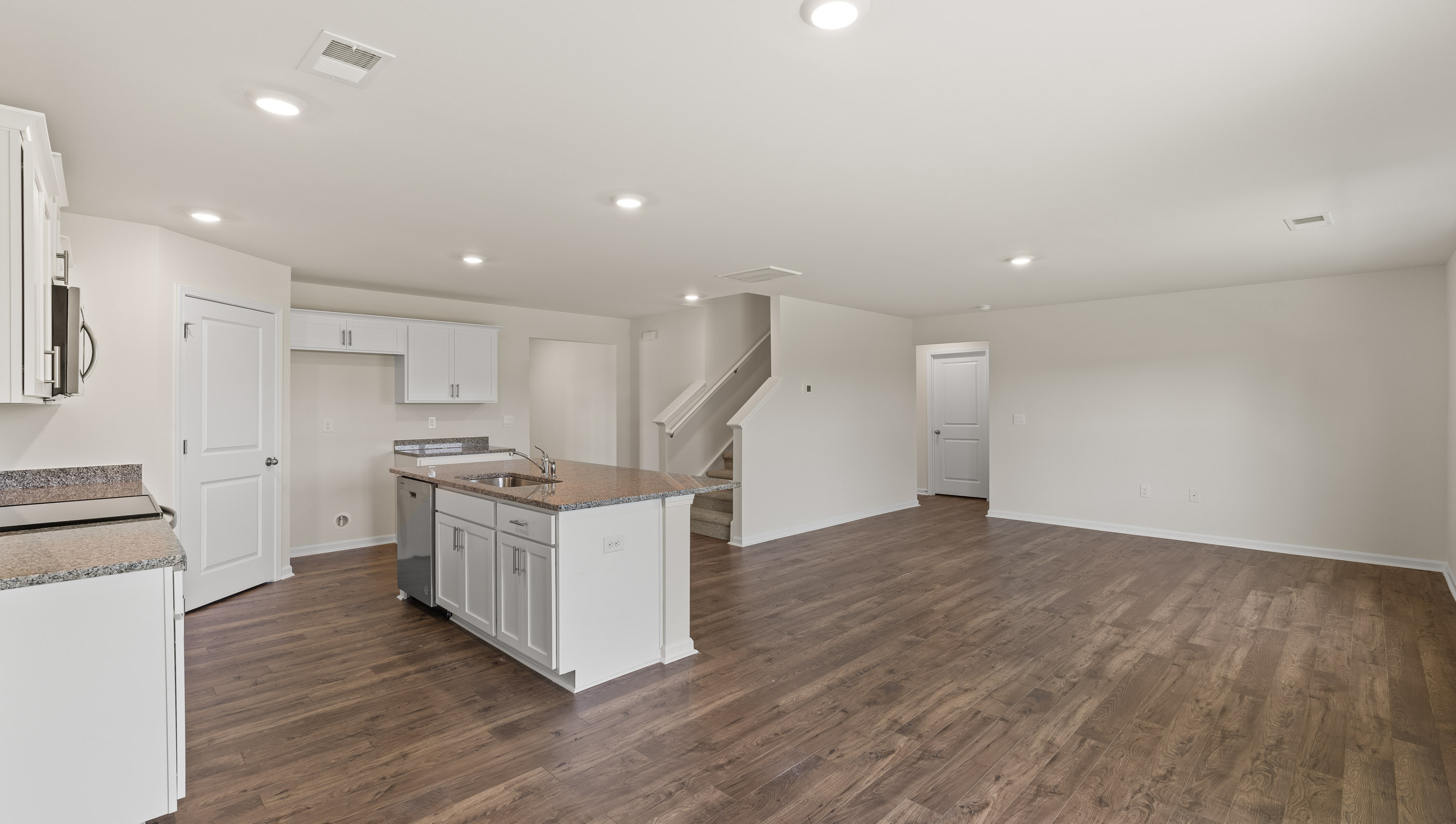 Kitchen with island and stainless steel appliances