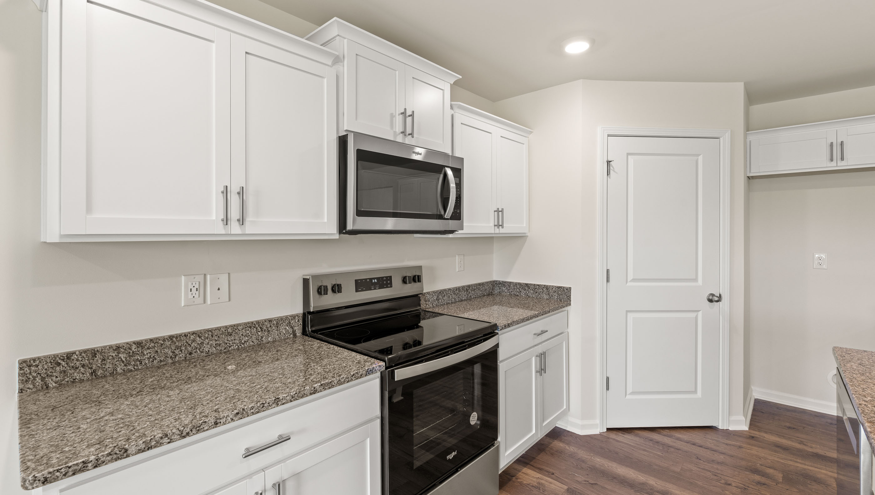 Kitchen with island and stainless steel appliances