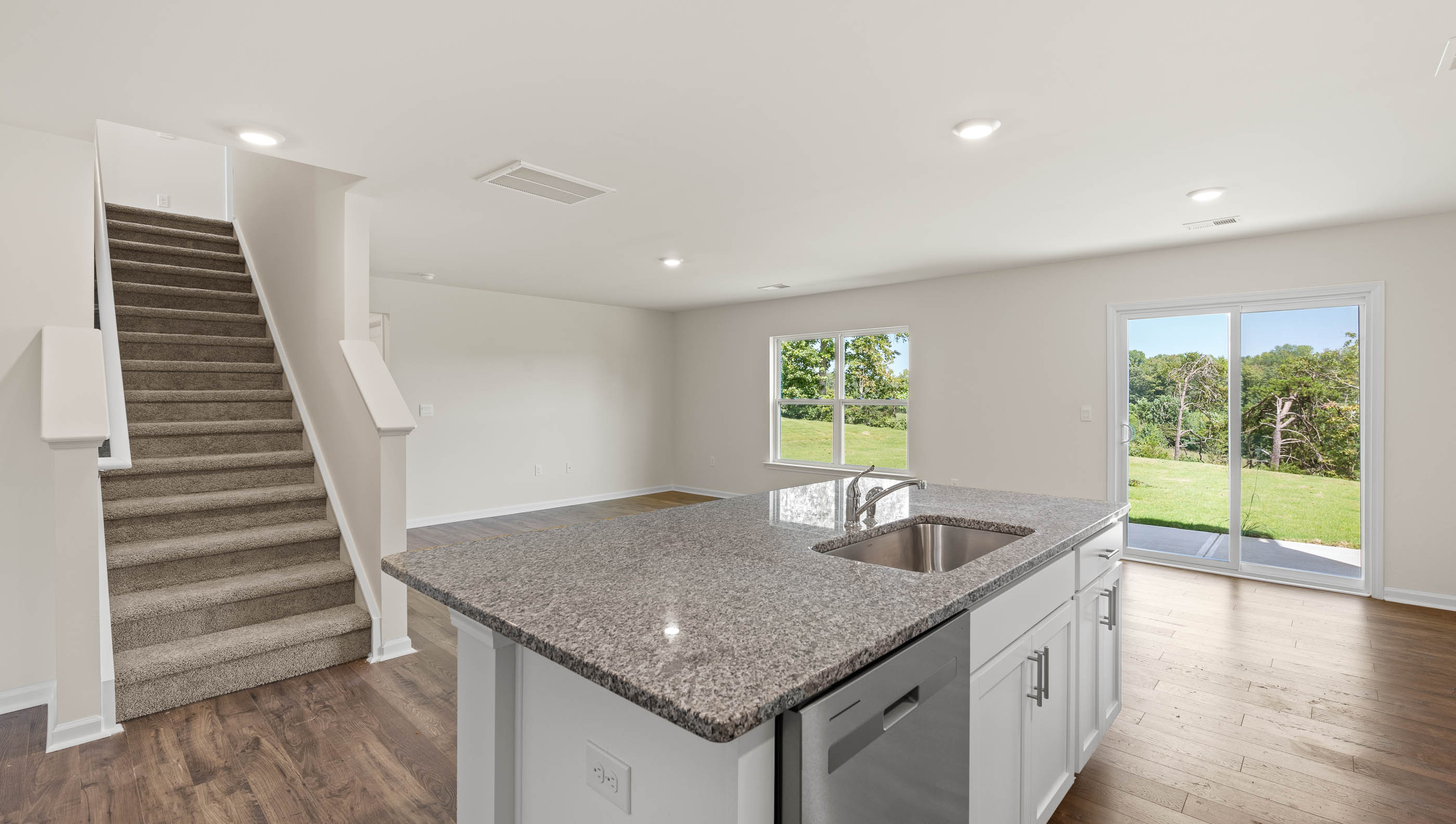 Kitchen with island and stainless steel appliances