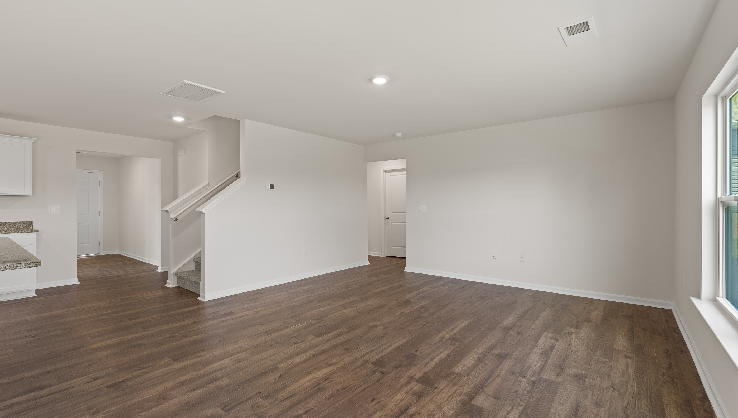 Open living area with large windows