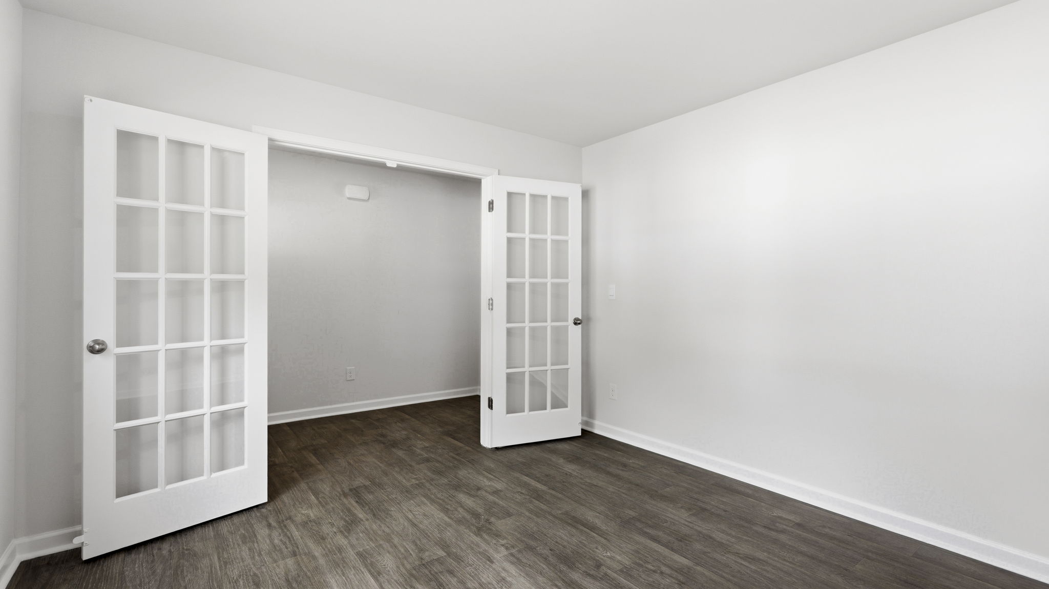 Office with glass doors to hall