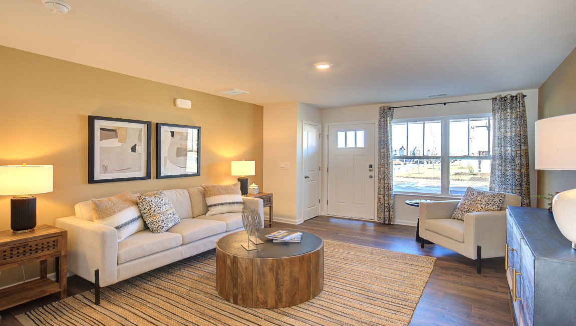 Foyer and family room, wood floors, large window