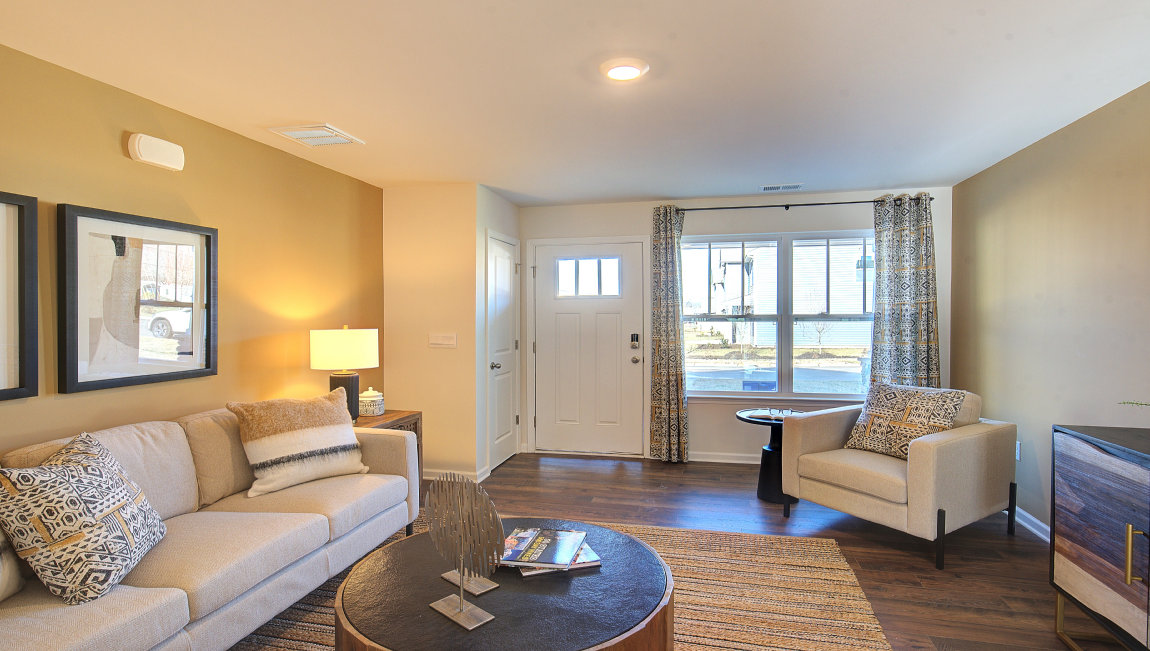 Foyer and family room, wood floors, large window