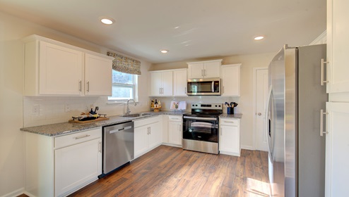 kitchen with white cabinets and stainless steel appliances