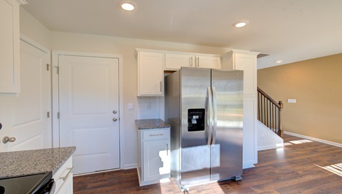 kitchen with white cabinets and stainless steel appliances