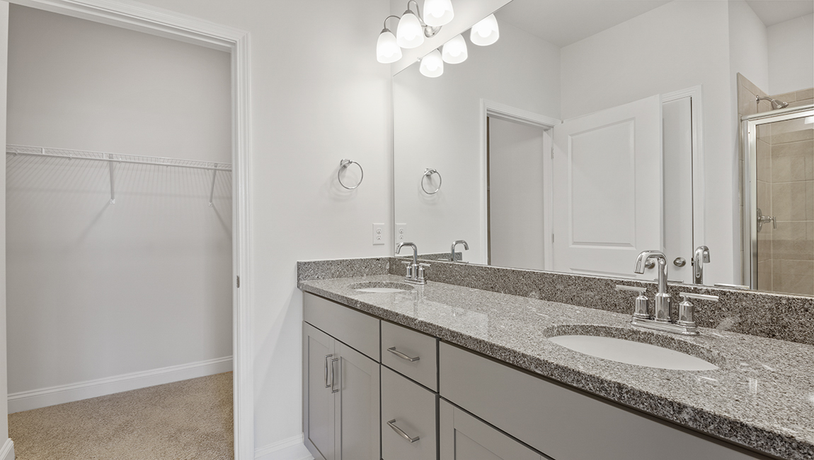 Primary bathroom ensuite with double sink vanity