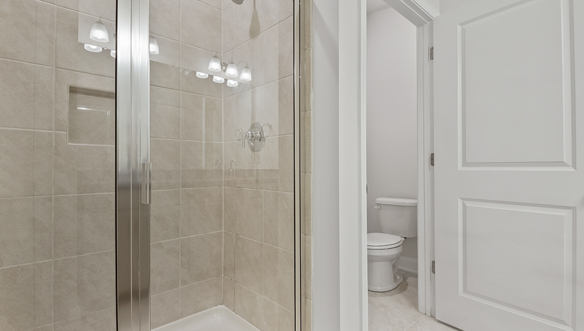 Primary bathroom ensuite with double sink vanity