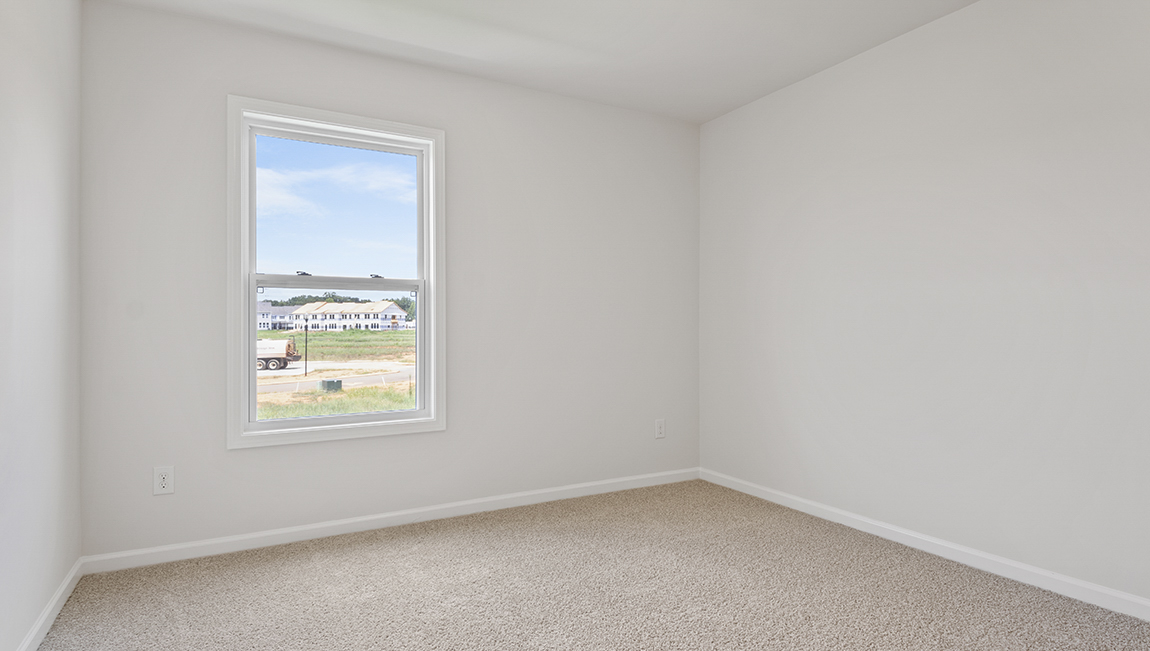 Secondary bedroom with large window
