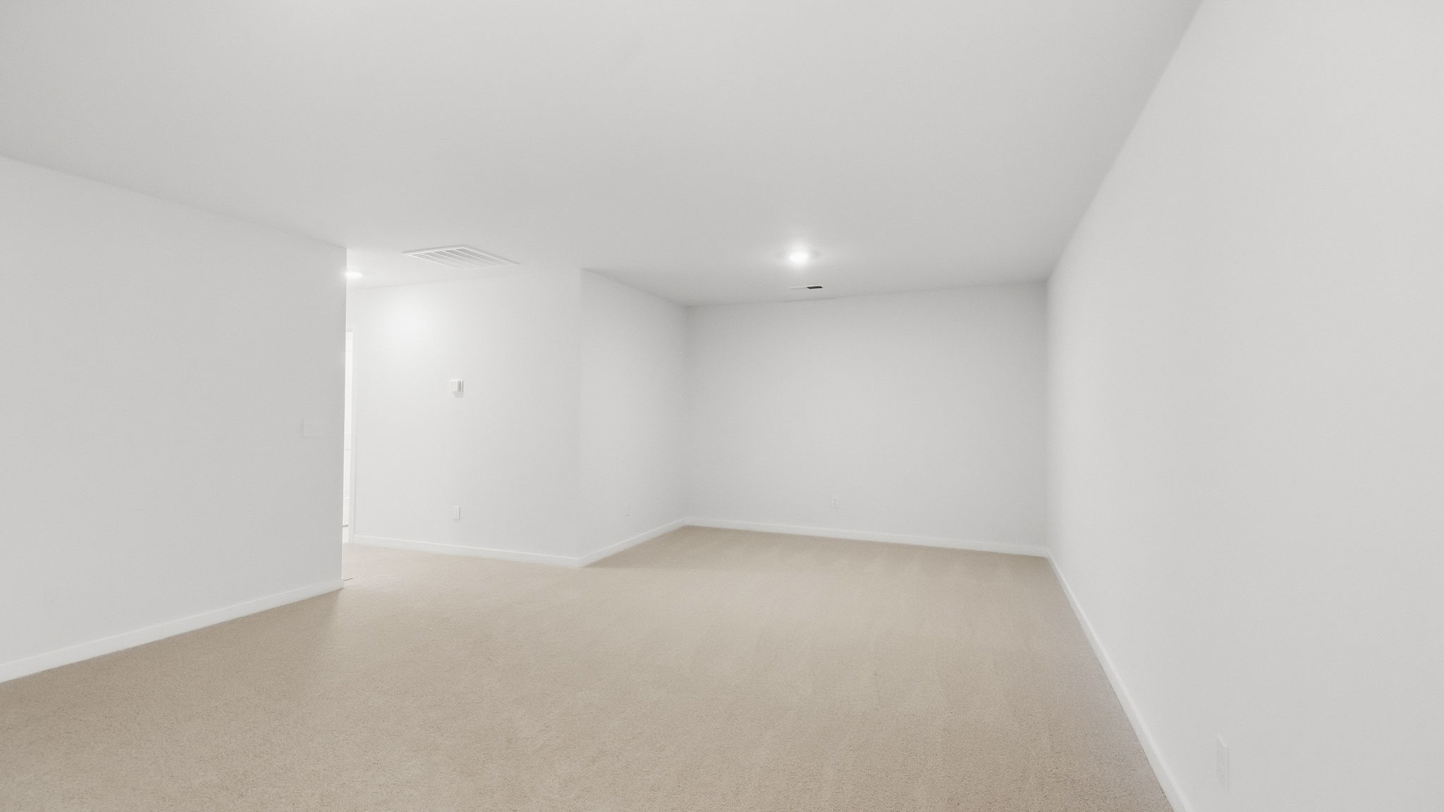 Carpeted large loft area