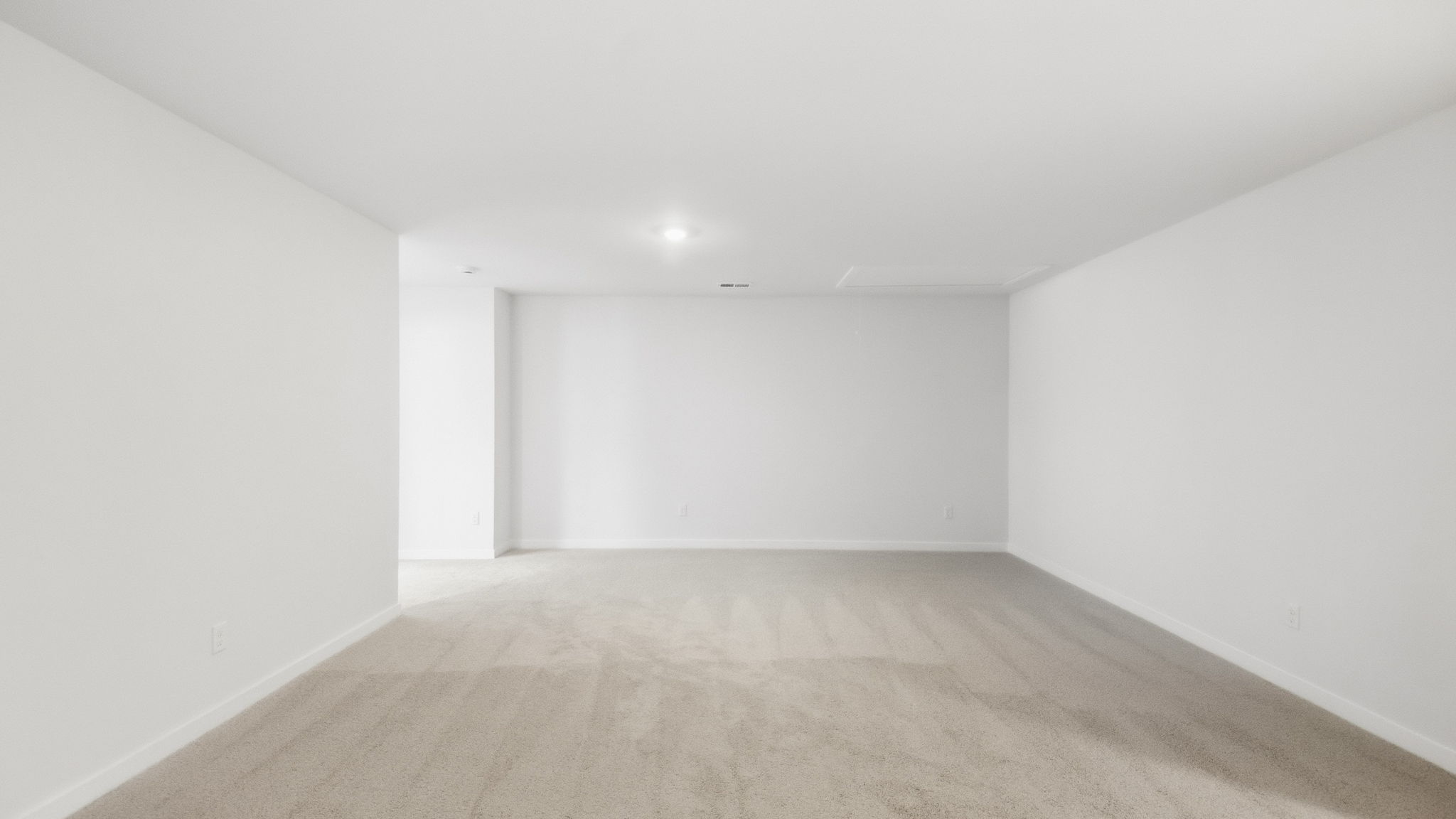 Carpeted large loft area