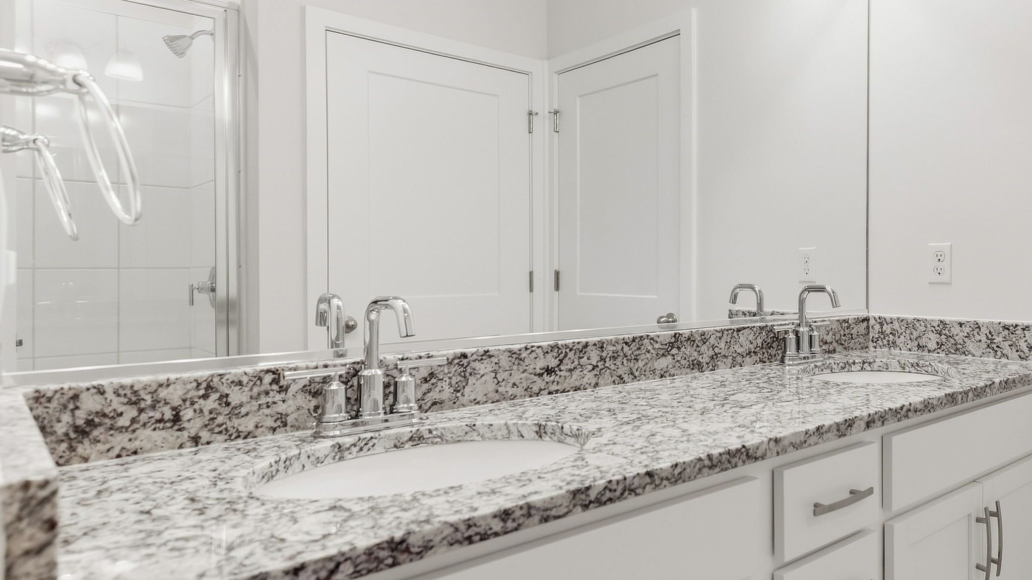 Primary bathroom with dual vanity