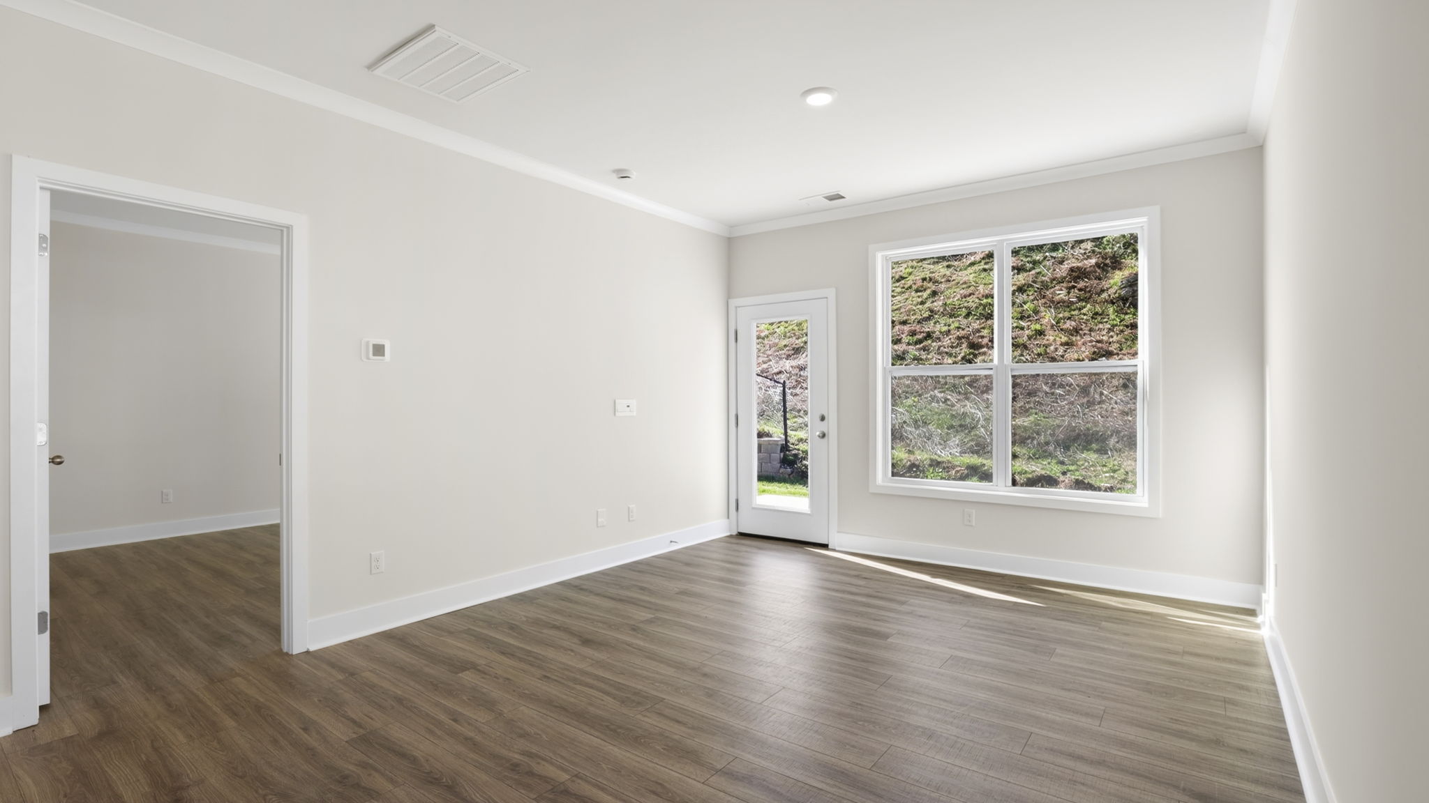 Open living room area with large windows