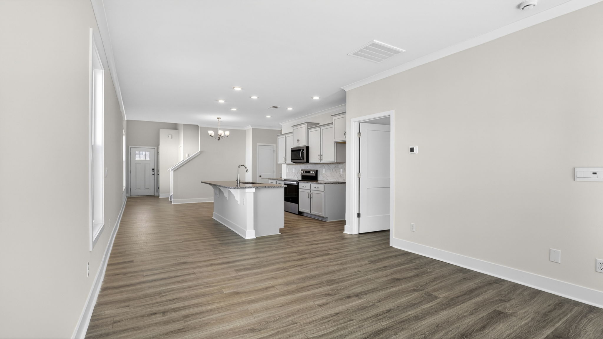 Open living room area with large windows
