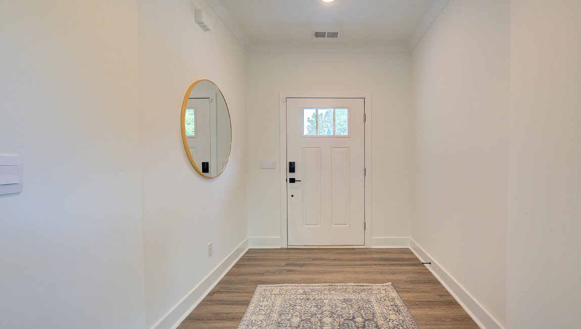Welcoming foyer with interior of front door