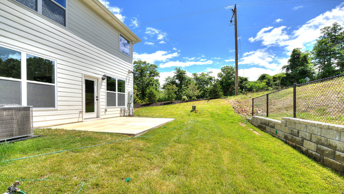View of exterior and back yard