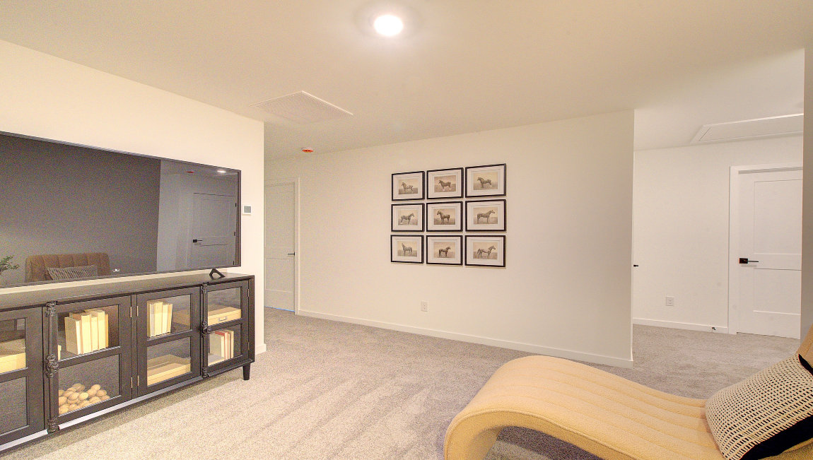 Carpeted loft area upstairs