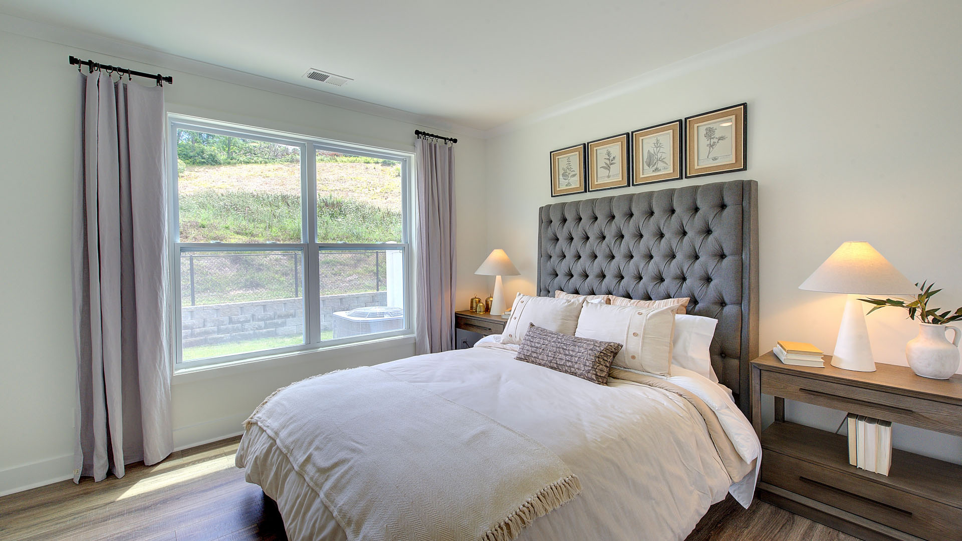 First floor bedroom with large windows