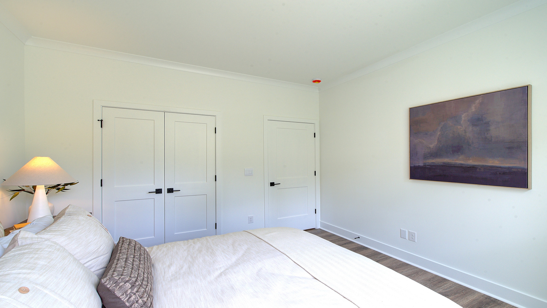 First floor bedroom with large windows