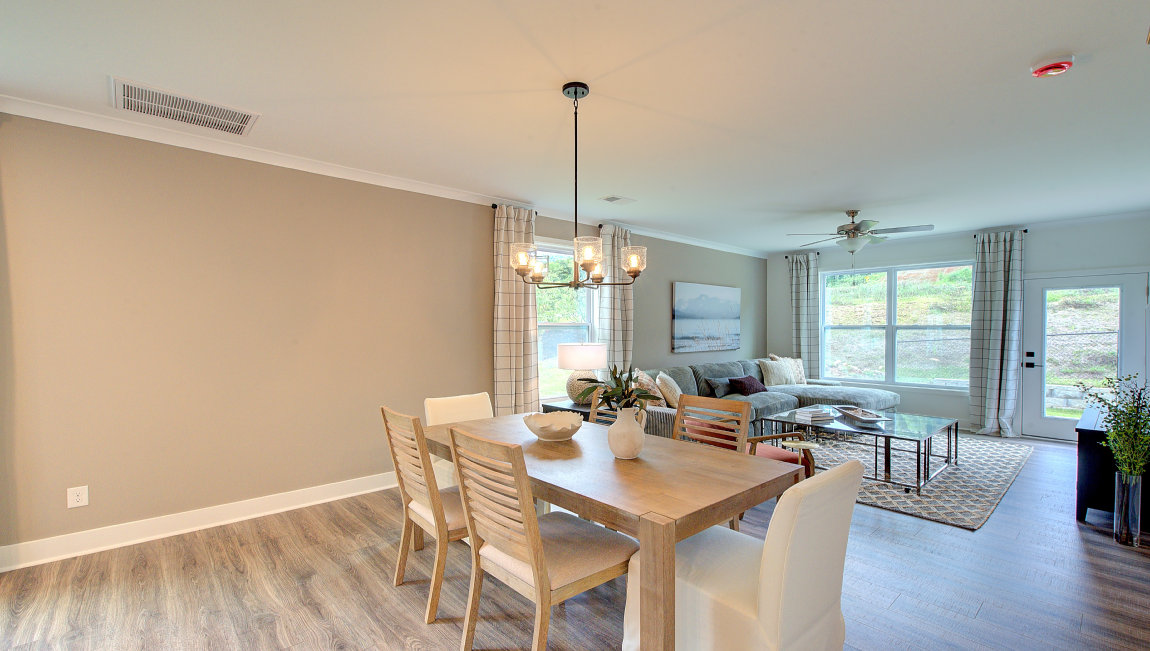 Open dining area with large windows