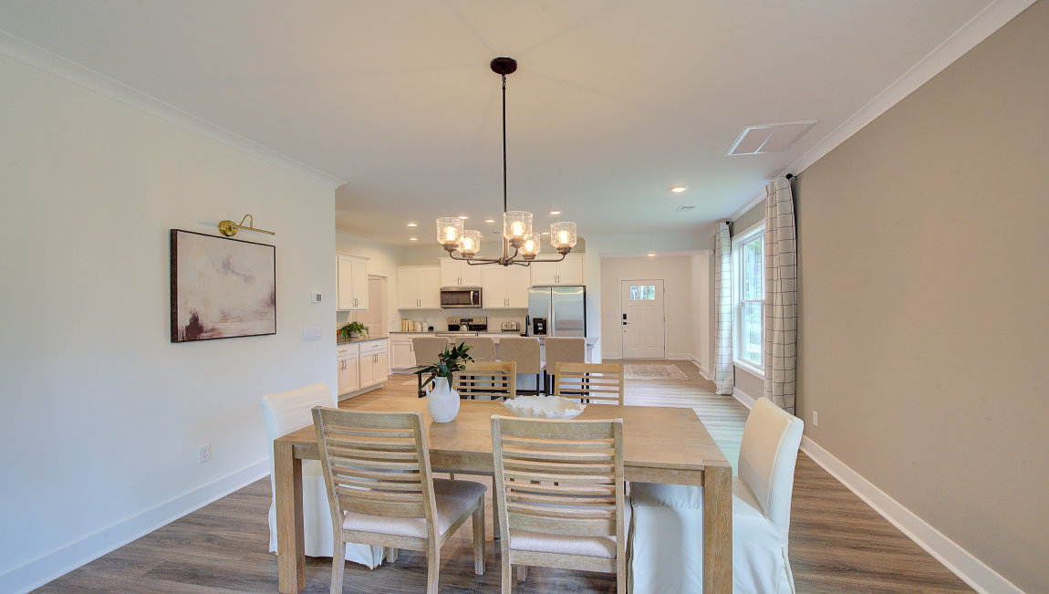 Open dining area with large windows