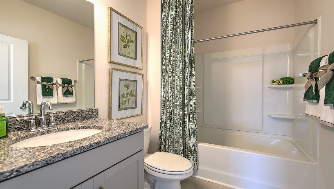 Bathroom with bathtub and shower combination