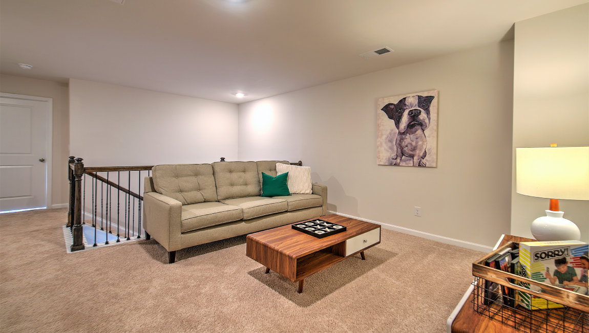 Upstairs living room with carpet