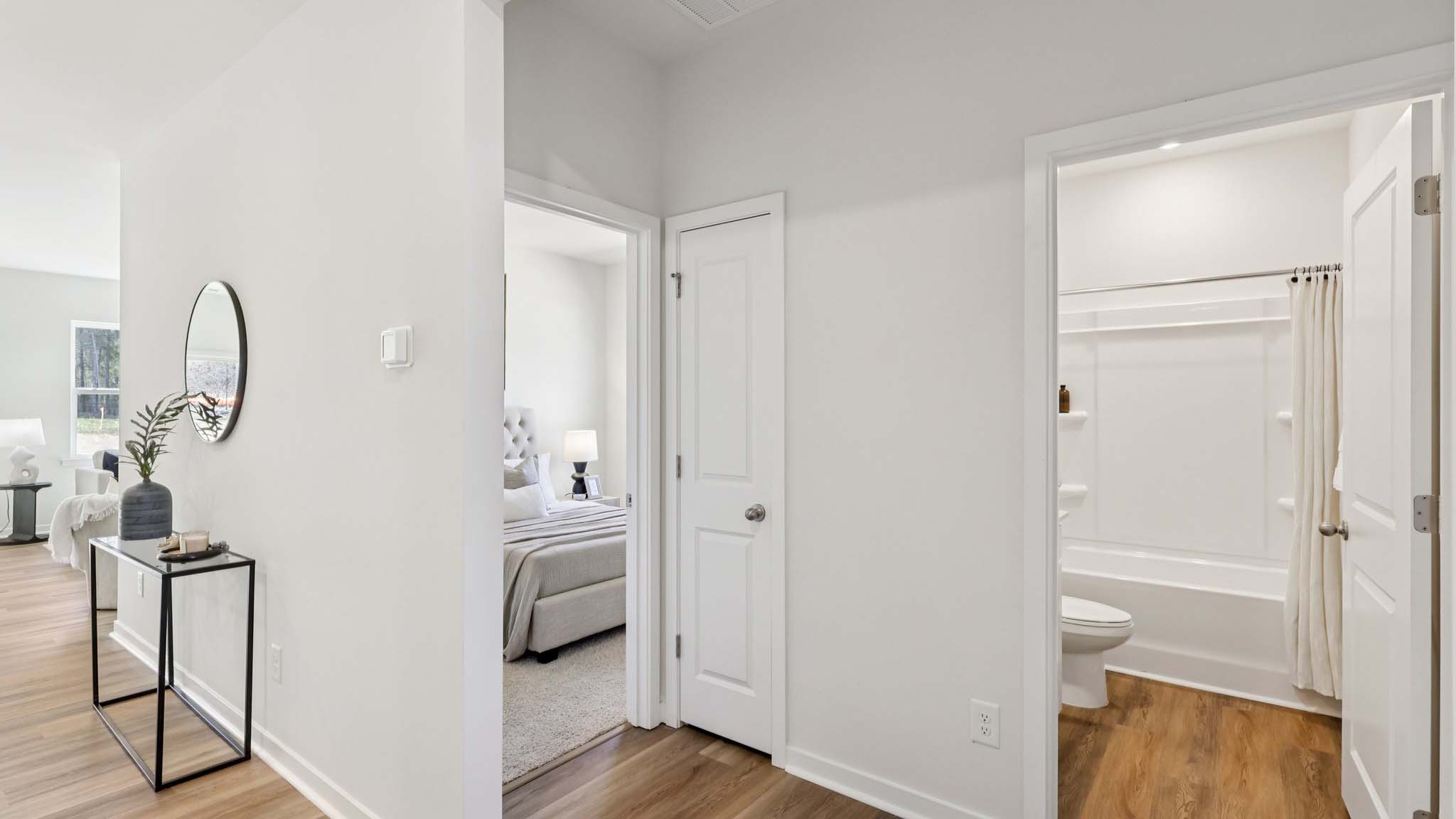 Front foyer with view of hallway and front bedroom