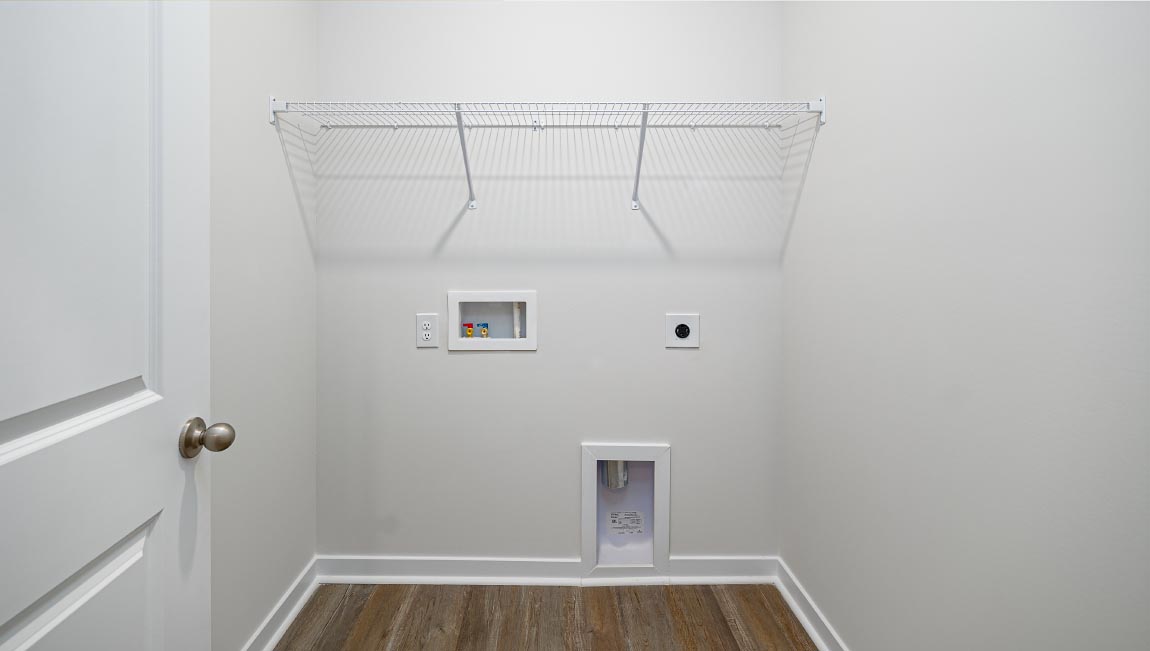 Laundry room with shelving