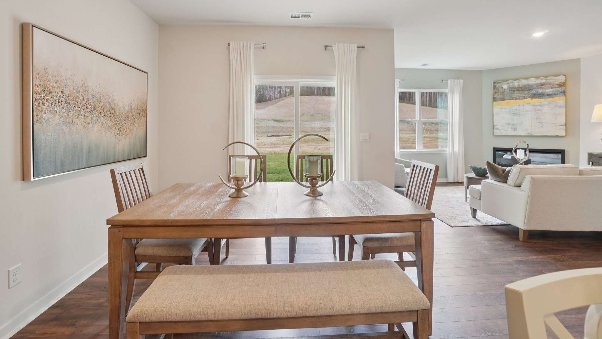 Open dining area with sliding glass doors to patio