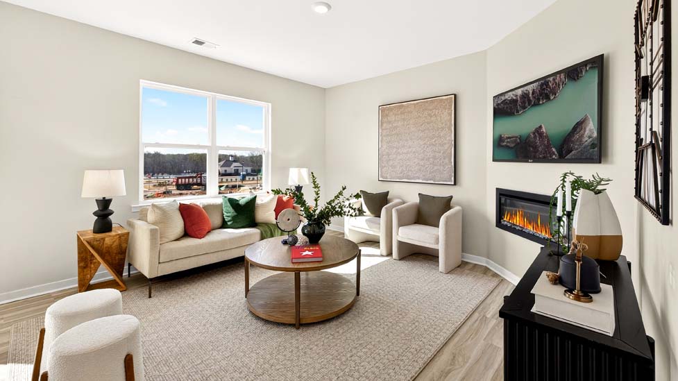 Open concept living room with electric fireplace