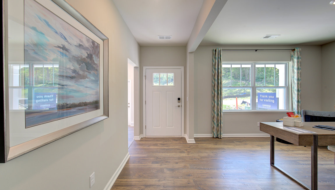 Welcoming foyer with flex space