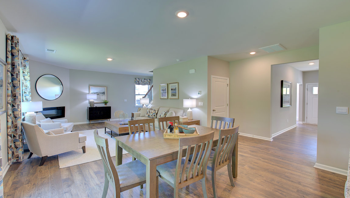 Open dining area with sliding glass doors to back patio