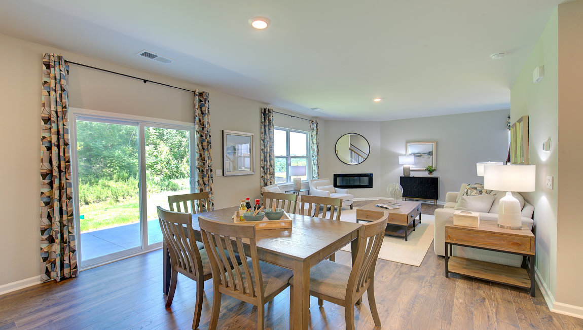 Open dining area with sliding glass doors to back patio