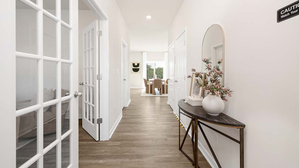 Welcoming front foyer with office on left