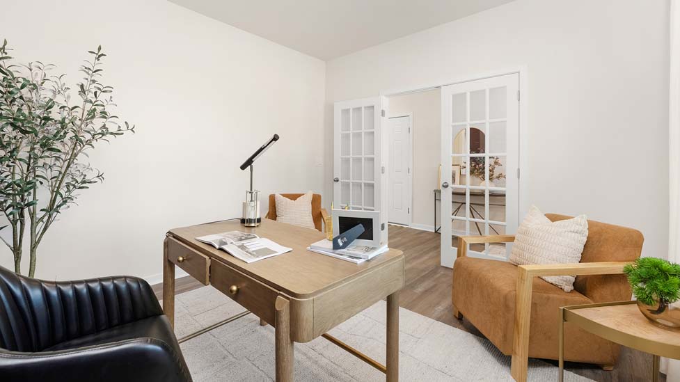 Office with glass doors to hallway