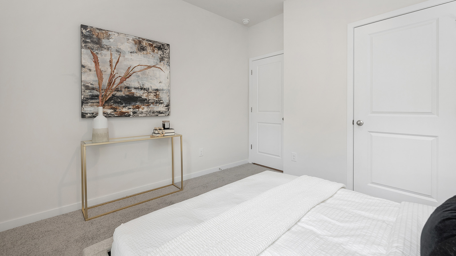 Carpeted bedroom with window