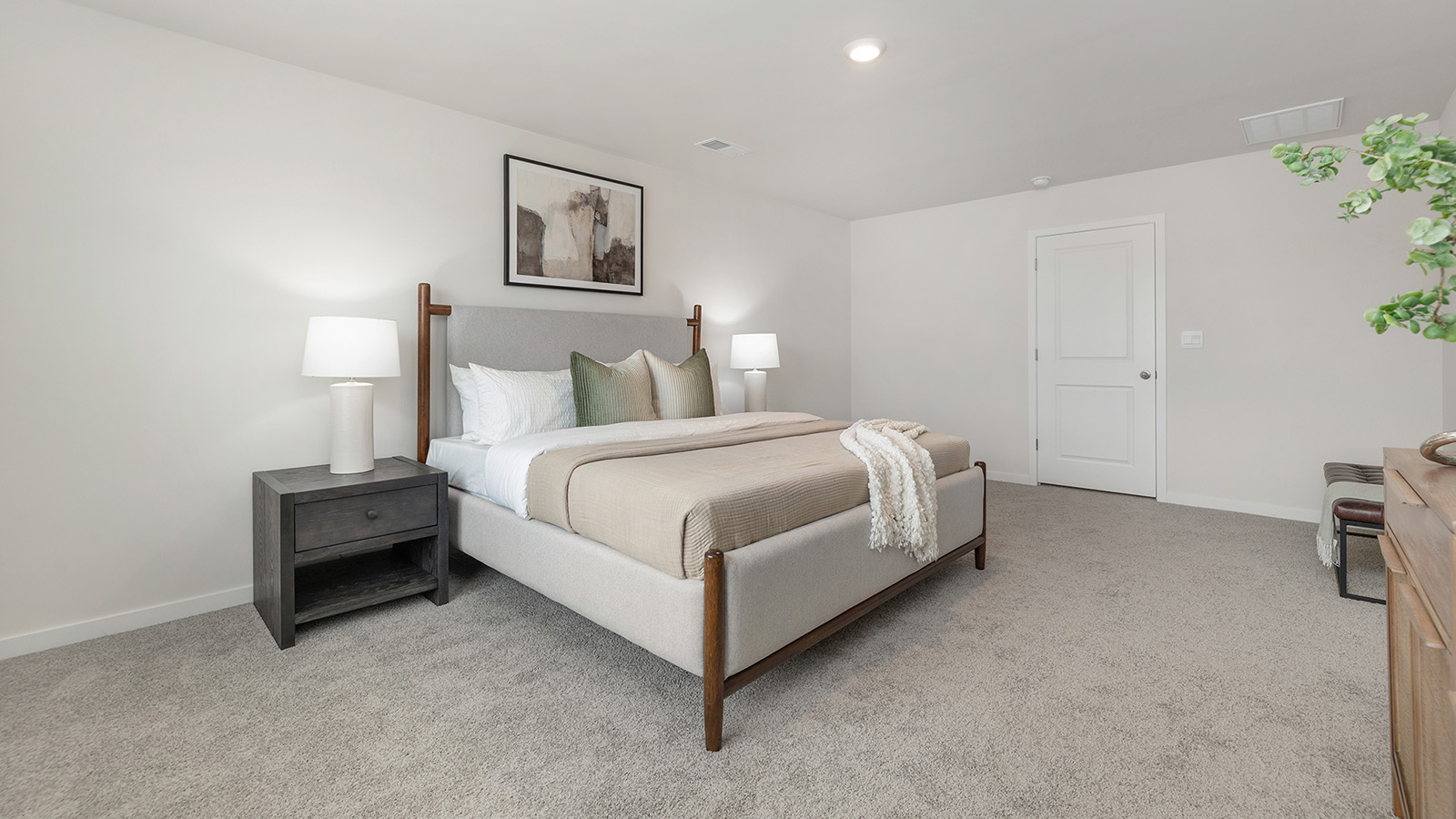 Carpeted primary bedroom