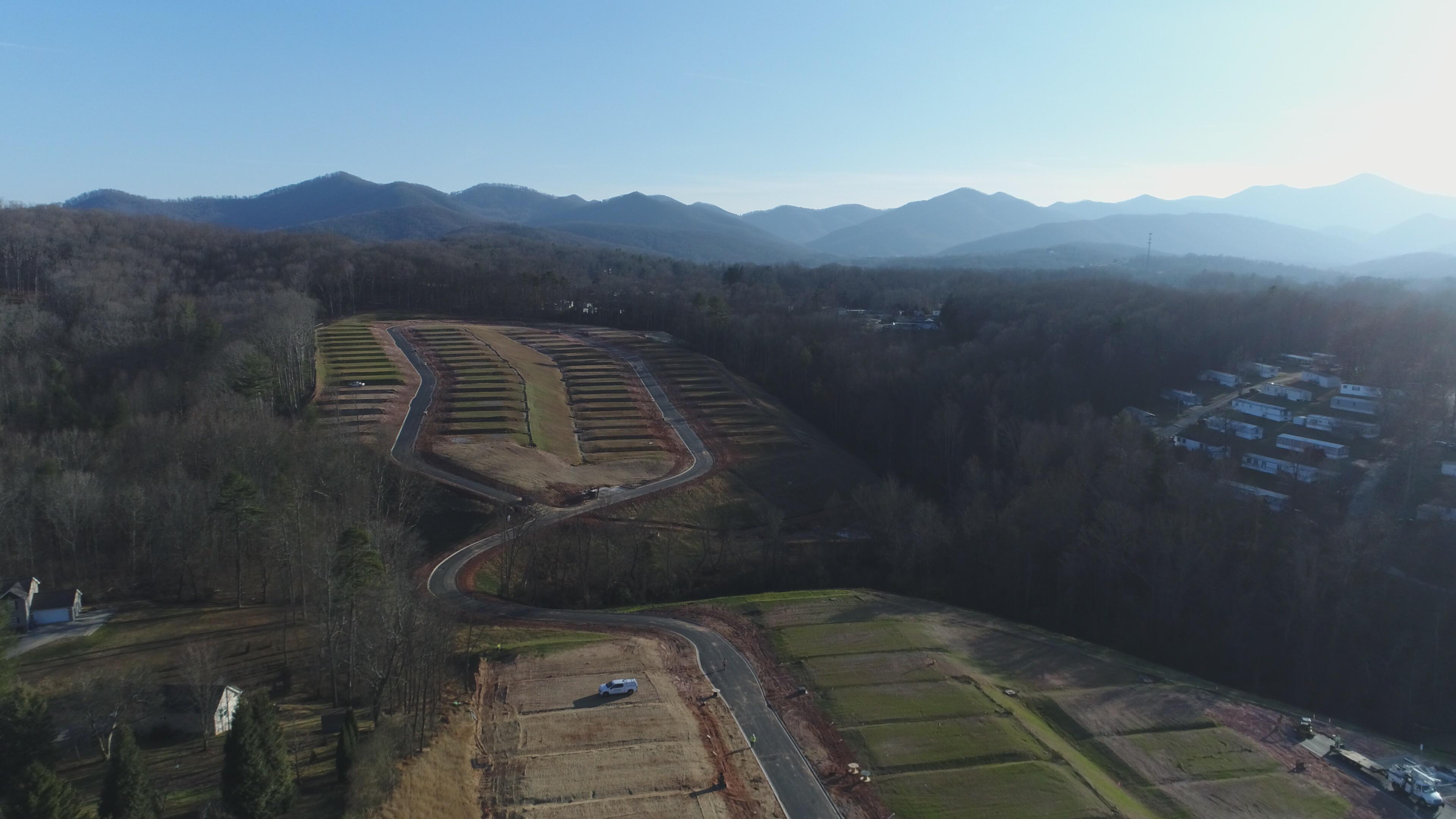 Drone view of rolling hills and mountains