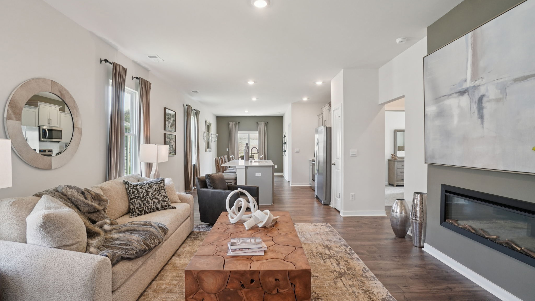 Open concept living area with electric fireplace