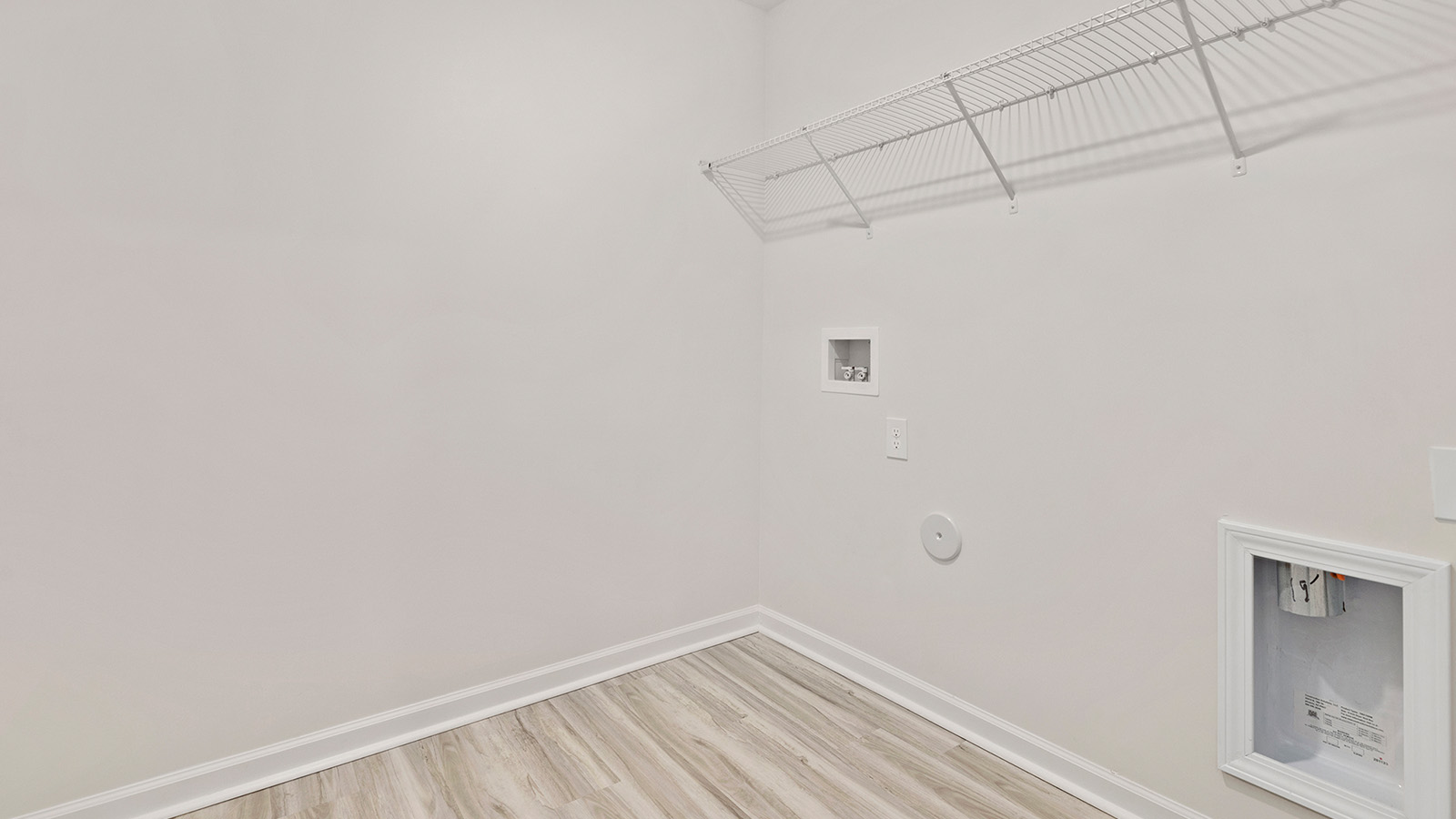 Laundry room with built in shelving