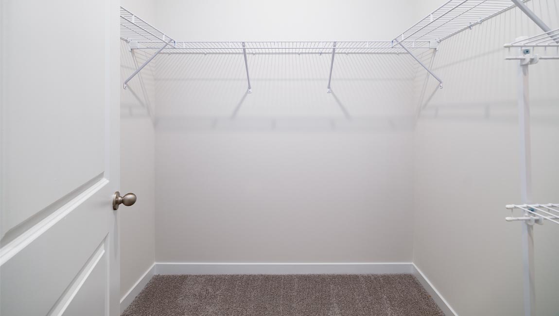 Walk in closet with built in shelving