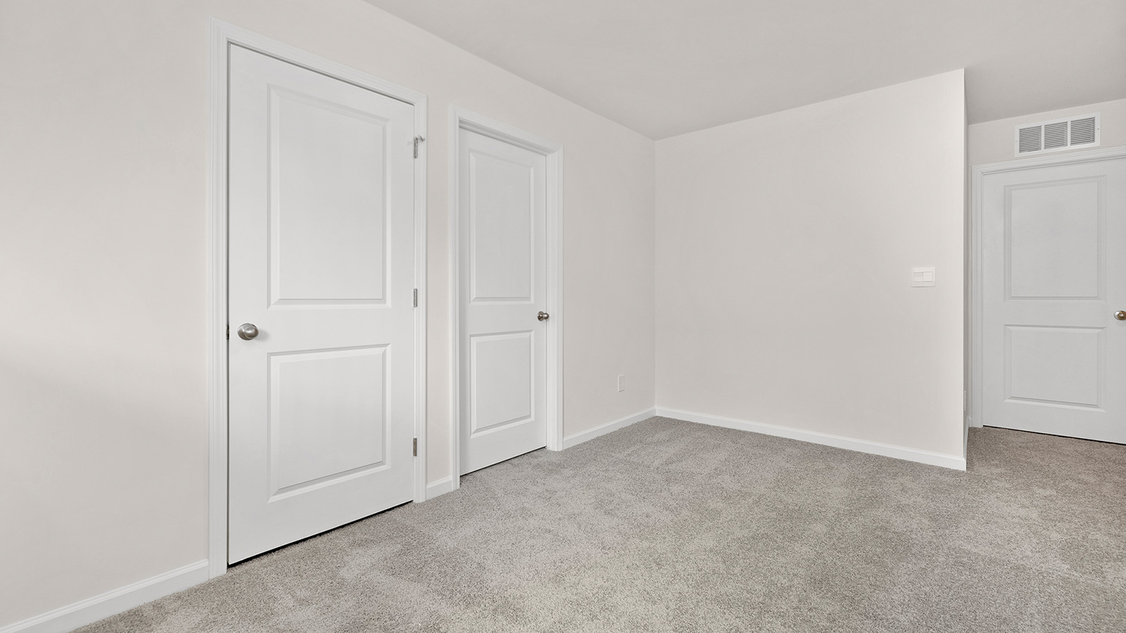 Loft with carpet and large window